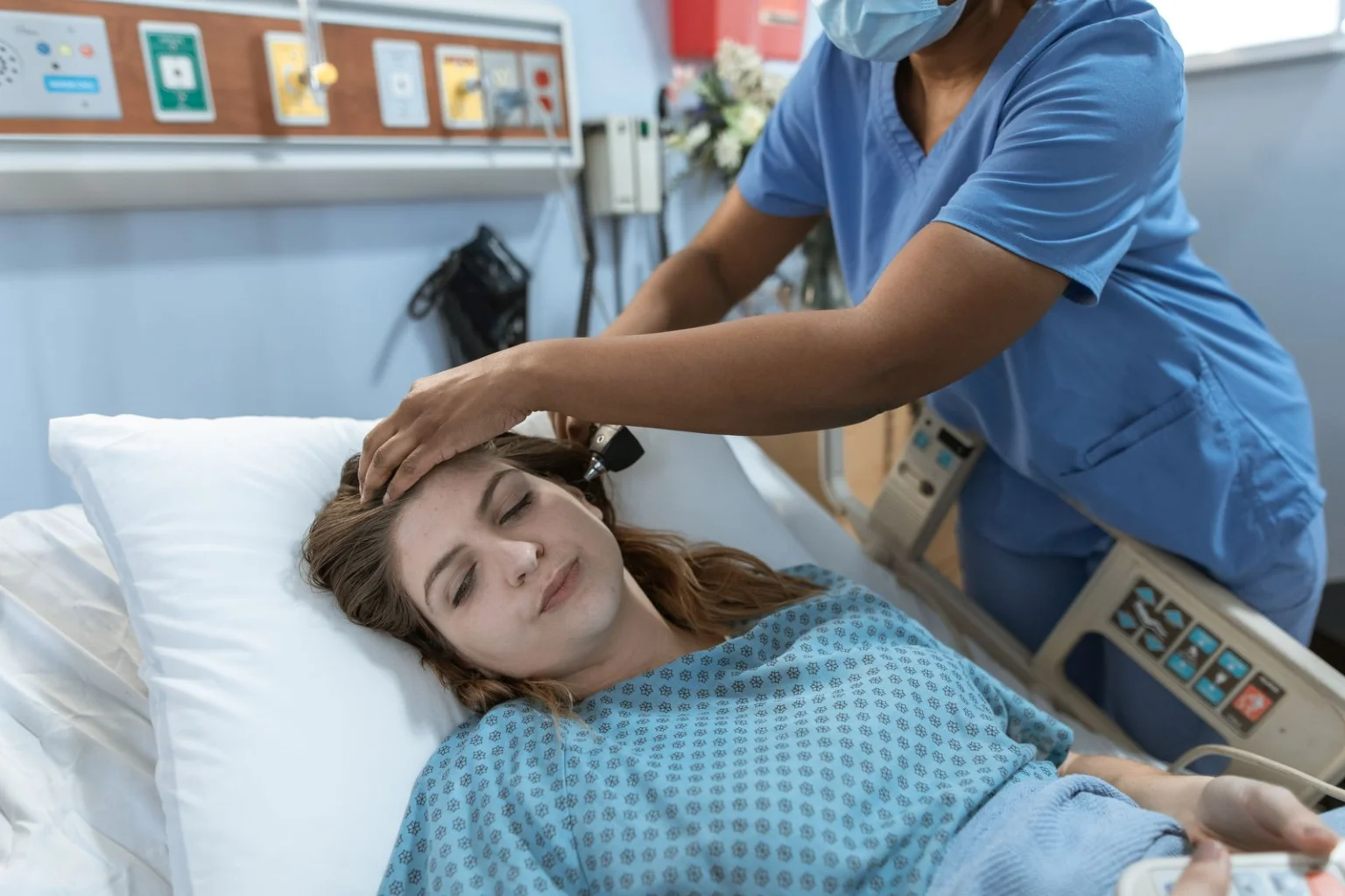 Nurse providing compassionate patient care at the bedside